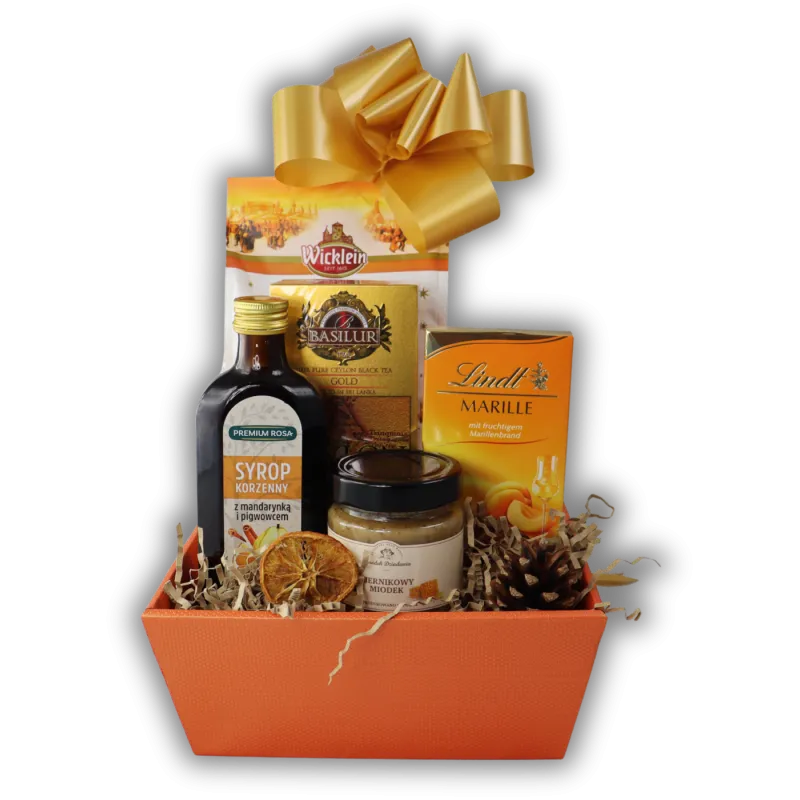 Kosz Prezentowy Aromat Świąt — pierniki, herbata Basilur, syrop korzenny i czekolada Lindt. Elegancki prezent na Boże Narodzenie z dostawą.